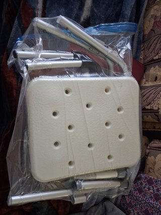 Silla de ducha con asas