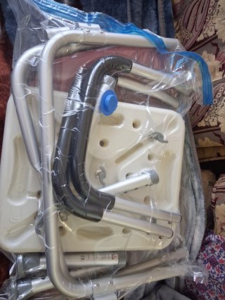 Silla de ducha con asas