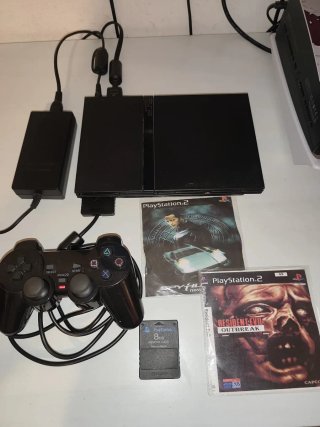 PlayStation 2 slim con Memory Card e giochi