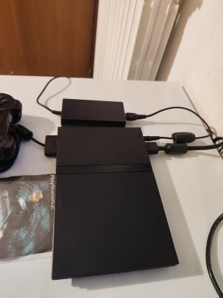PlayStation 2 slim con Memory Card e giochi