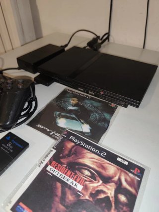 PlayStation 2 slim con Memory Card e giochi