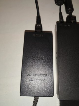 PlayStation 2 slim con Memory Card e giochi