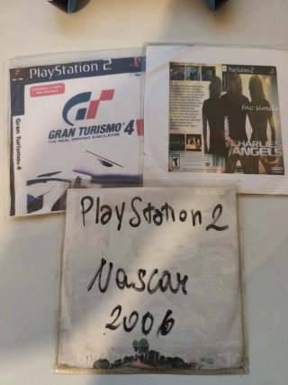 PlayStation 2 slim con Memory Card e giochi
