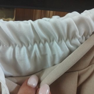 Falda beige tablas doble cintura talla única