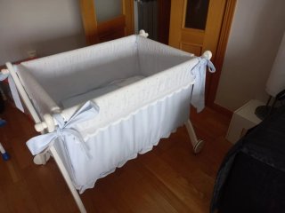 Minicuna bebé azul con estrellas