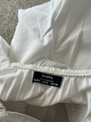 Mono corto blanco con cremallera