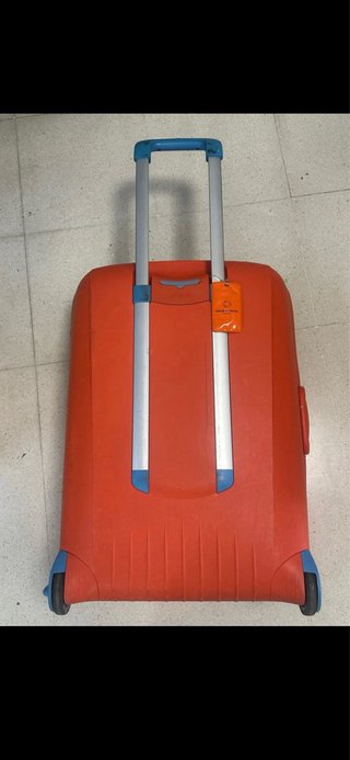 Maleta y maletín naranja a juego