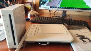 Consola Wii con 6 juegos y karaoke