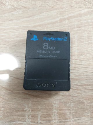 Caja PS2 Slim + 2 mandos + 8 juegos y tarjeta