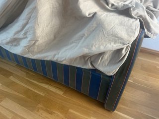 sofá cama y gris