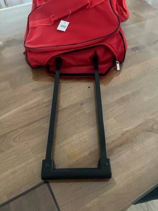 Bolsa de viaje de tela marca Casa.