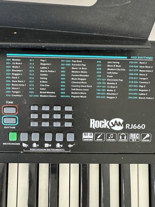 Teclado electrónico con soporte y banqueta