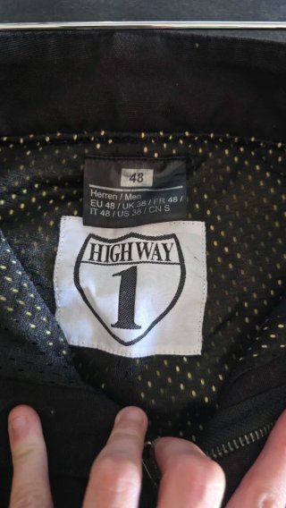 Pantalones de moto negros con protecciones