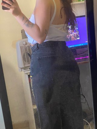 Pantalón vaquero negro con smiley desgastado