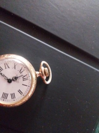 Relógio de bolso antigo em ouro de 18k.