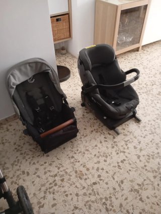 Carrito de bebé marron y negro marca jane
