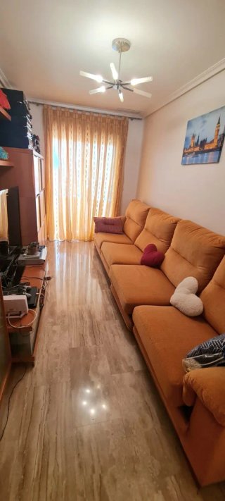 2 Sofás Cama Naranja su valor nuevo 1400 cada uno
