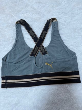 Top deportivo Puma gris y dorado