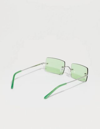 Gafas de sol doradas y amarillas y negras , verdes