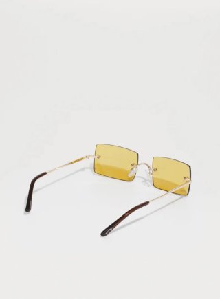 Gafas de sol doradas y amarillas y negras , verdes