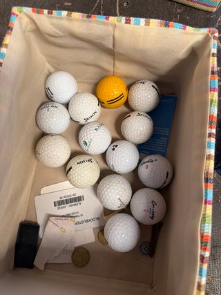 14 palos de golf y 26 bolas de