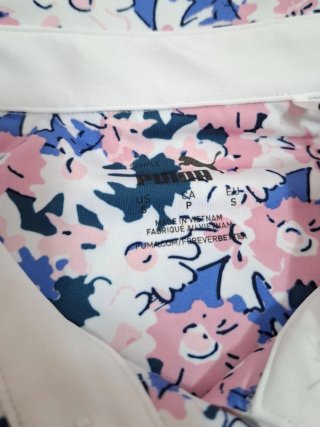 Polo Golf Puma sin mangas floral