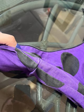 Traje de flamenca morado con lunares negros