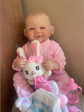 Bambola reborn con accessori