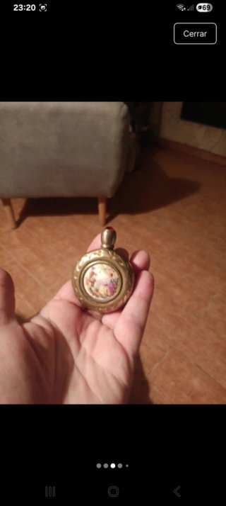 Perfumero antiguo con tapa de joya