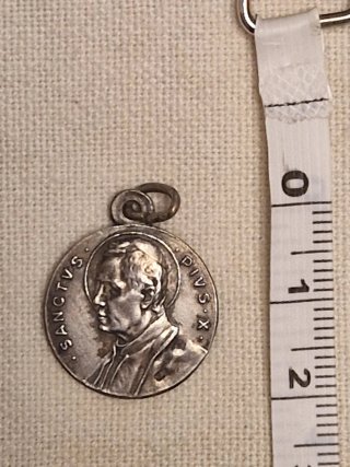 Antigua medalla de plata de San Pio X