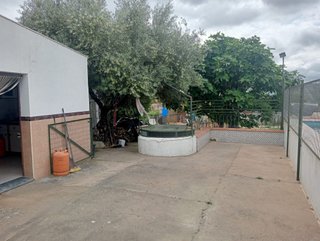 Terreno con casa de campo