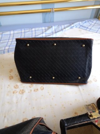 Set valigie in pelle nera e marrone