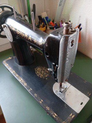 Cabeza de maquina de coser