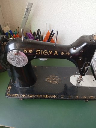 Cabeza de maquina de coser