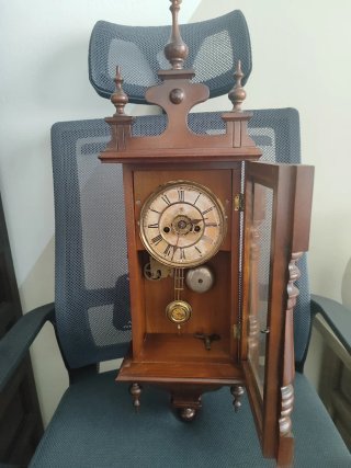 Reloj de pared antiguo madera y metal