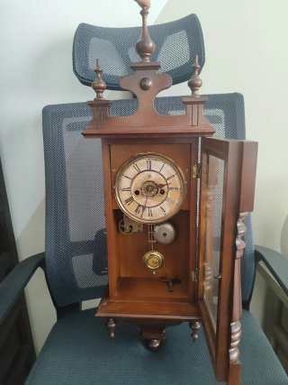 Reloj de pared antiguo madera y metal