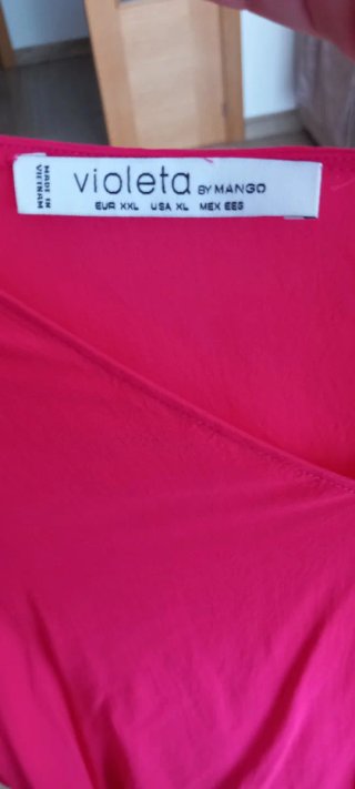 Blusa fucsia con lazada en espalda talla 2XL