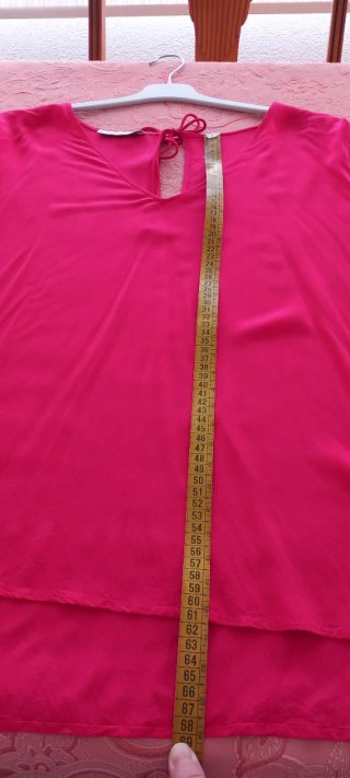 Blusa fucsia con lazada en espalda talla 2XL