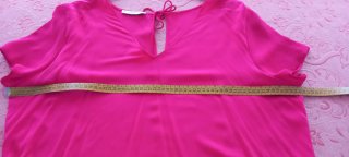 Blusa fucsia con lazada en espalda talla 2XL