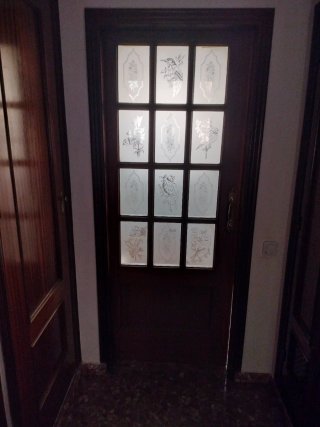Puertas de madera corredera con cristales decorado
