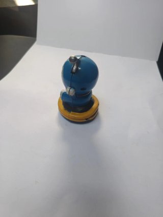Mechero gato azul y amarillo