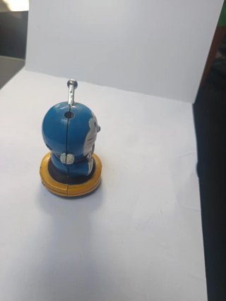 Mechero gato azul y amarillo