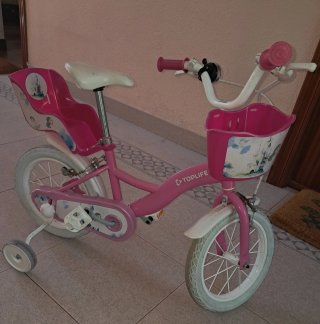 Bicicleta niña rosa con ruedines