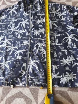 Chubasquero unisex estampado palmeras