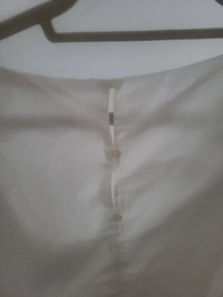 Blusa blanca con volantes