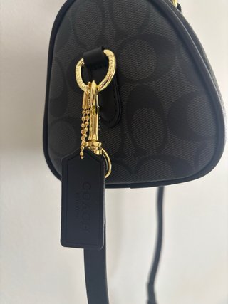Bolsa Coach Mini Rowan Preta Dourada