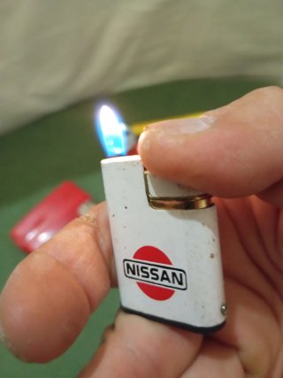 Collezione Vintage di Accendini: Marlboro, Nissan, Coca-Cola