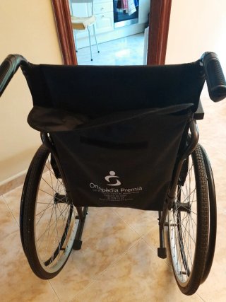 Silla de ruedas para invalido casi nueva  plegable