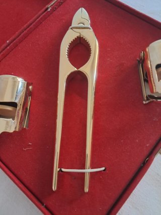 Set vintage pinza e tappi spumante ottone