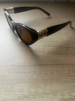 Gafas de sol miu miu negras